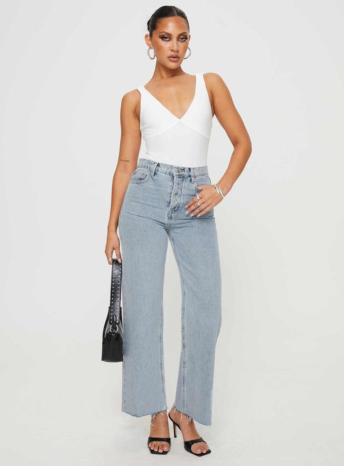 front view of model wearing Princess Polly Fawcett Jeans Light Wash Denim High Waisted