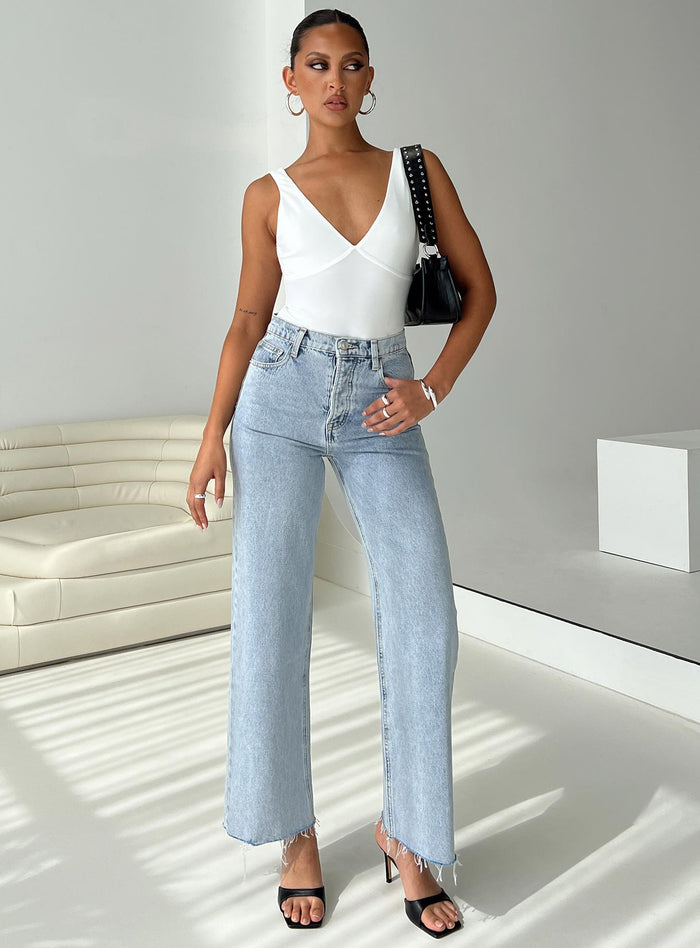 front view of model wearing Princess Polly Fawcett Jeans Light Wash Denim High Waisted