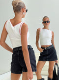 back view of model wearing Princess Polly Gazelle Denim Skort Washed Black High Waisted Shorts