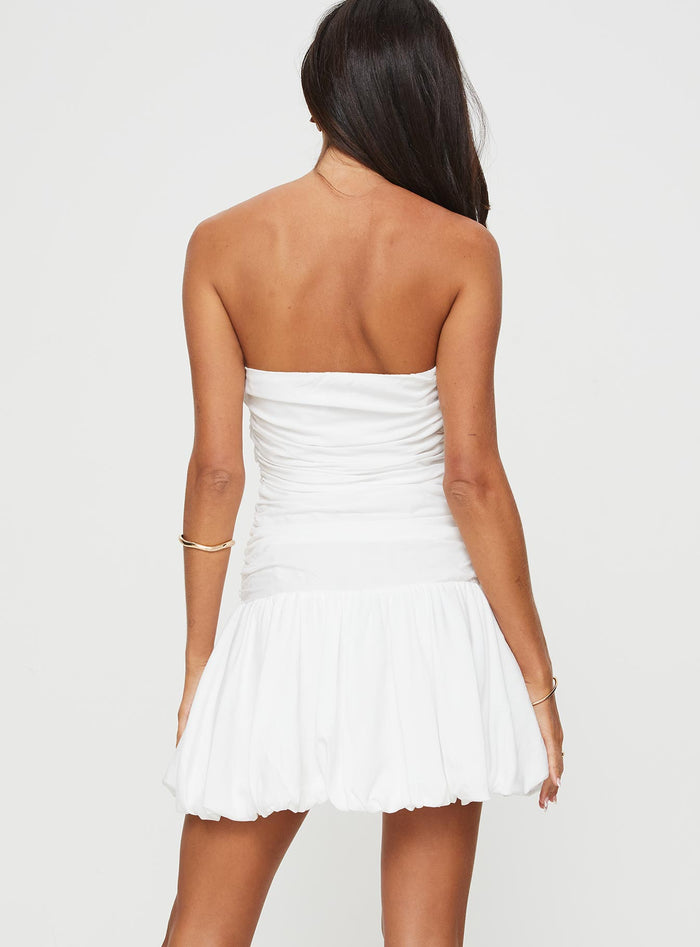 back view of model wearing Princess Polly Glamour Girl Strapless Bubble Hem Mini Dress White Straight Neck