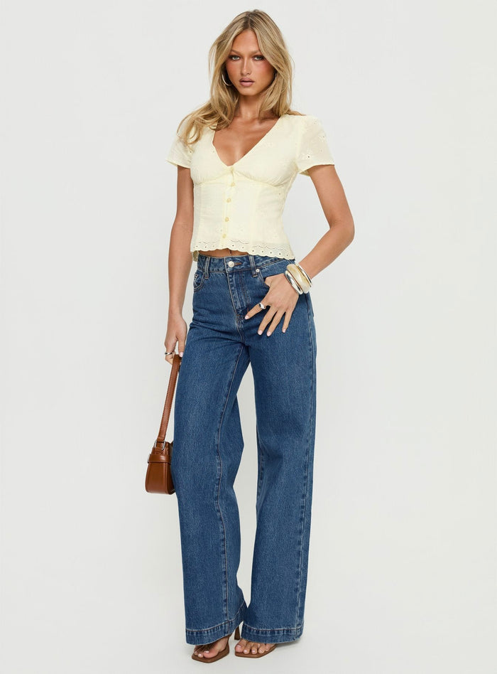 front view of model wearing Princess Polly Goldie High Rise Wide Leg Jeans Mid Blue Wash High Rise Jeans