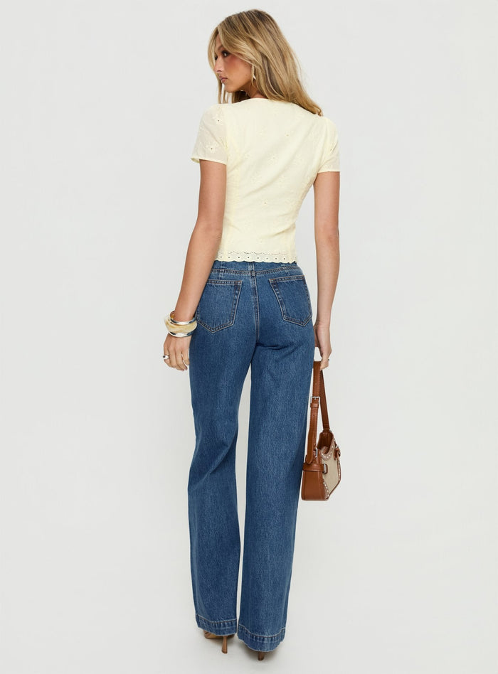 back view of model wearing Princess Polly Goldie High Rise Wide Leg Jeans Mid Blue Wash High Rise Jeans