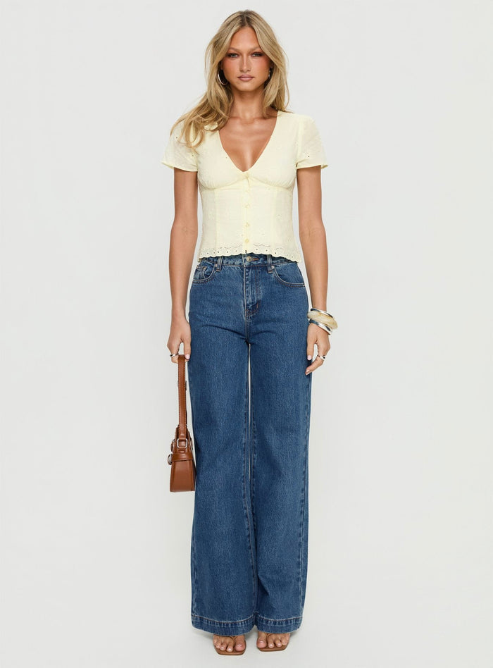 front view of model wearing Princess Polly Goldie High Rise Wide Leg Jeans Mid Blue Wash High Rise Jeans