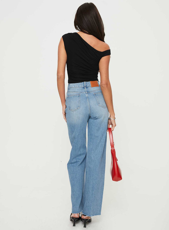 back view of model wearing Princess Polly Henesey Raw Hem Jeans Mid Wash High Waisted