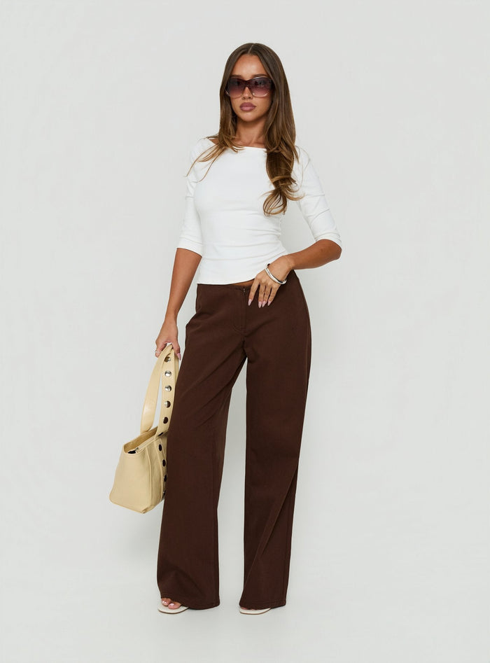 Presenting the Hereos Mid Rise Baggy Leg Jeans Washed Chocolate in womens-jeans detail view of model wearing Princess Polly