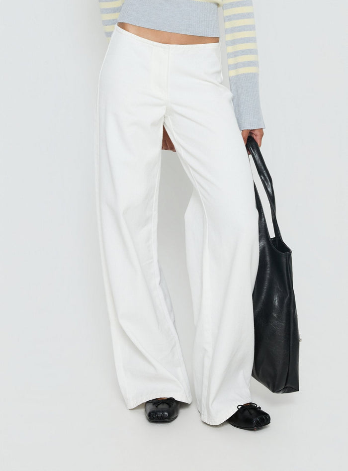 back view of model wearing Princess Polly Hereos Mid Rise Baggy Leg Jeans White Mid Rise Jeans Jeans