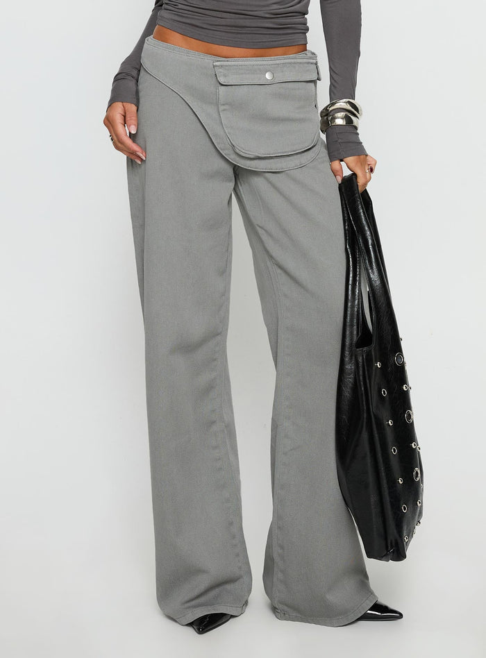side view of model wearing Princess Polly Incognito Low Rise Wide Leg Cargo Jeans Grey Low Rise Jeans