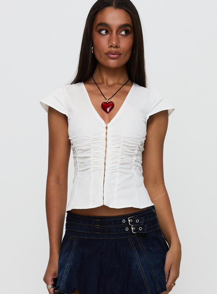 front view of model wearing Princess Polly Indulgence Corset Top White Short Sleeves V-Neck
