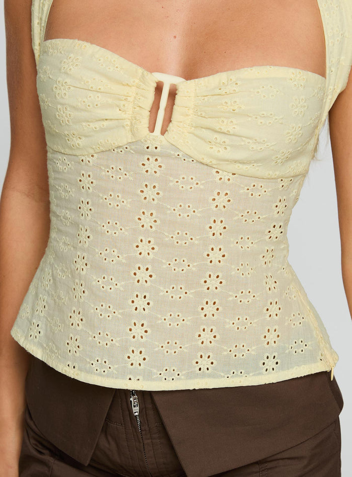 back view of model wearing Princess Polly Isabetta Halter Top Lemon Sleeveless Sweetheart