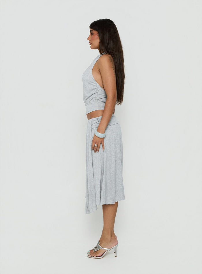 Designed with elegance, the Iselda Draped Midi Skirt Grey Marle womens-skirts in solid print side view of model wearing Princess Polly