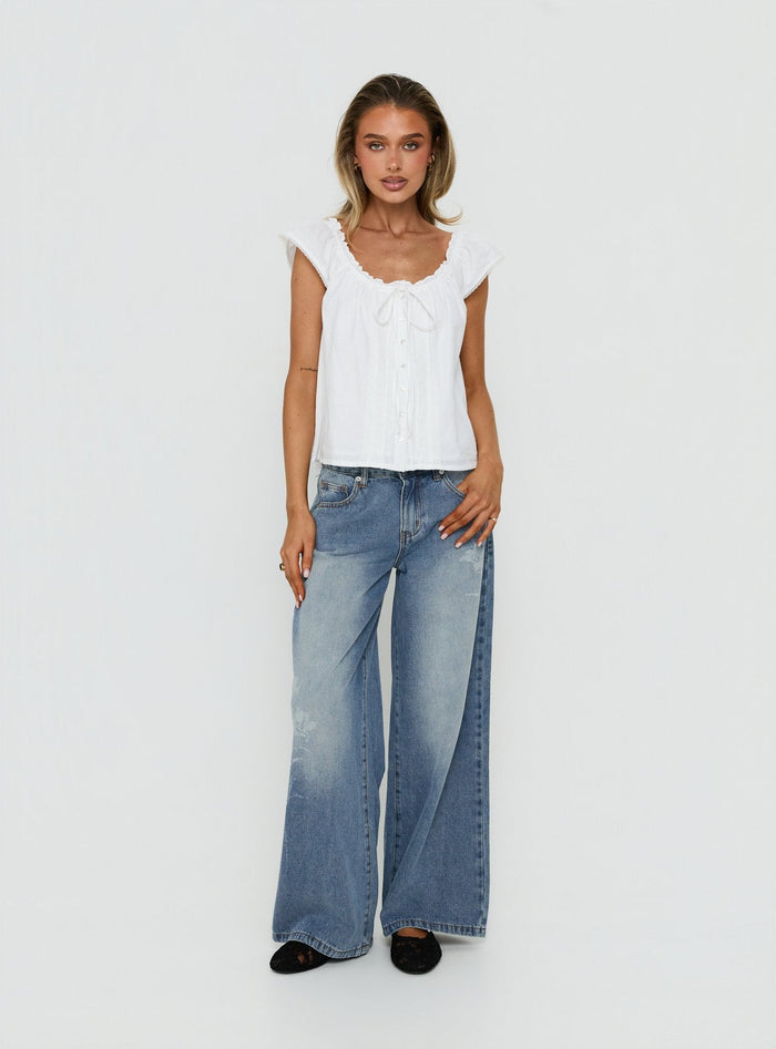 Featuring Johnni Floral Printed Low Rise Jeans Mid Wash womens-jeans with low-rise waist detail Princess Polly