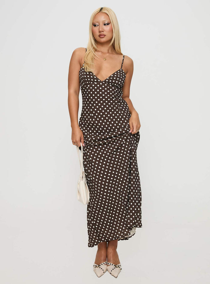 side view of model wearing Princess Polly Jorjana Polka Maxi Dress Brown / White Plunger