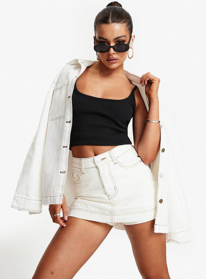 front view of model wearing Princess Polly Katlynne Denim Mini Skort White mid-rise