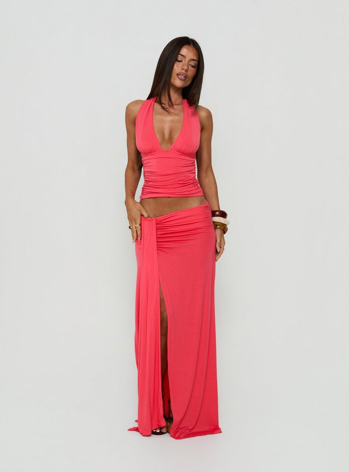 Showcasing the Keerah Ruched Maxi Skirt Guava in coral with womens-skirts category featuring maxi length front view of model wearing Princess Polly