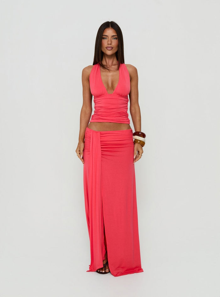 Showcasing the Keerah Ruched Maxi Skirt Guava in coral with womens-skirts category featuring maxi length front view of model wearing Princess Polly