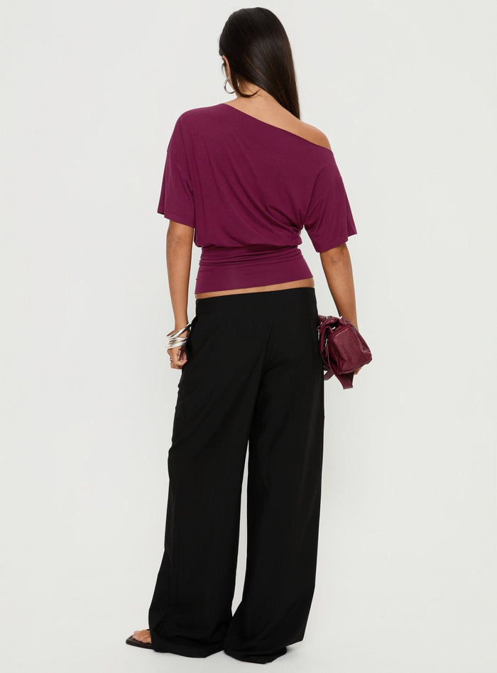 back view of model wearing Princess Polly Khane Low Rise Wide Leg Pant Black Low Rise Pants