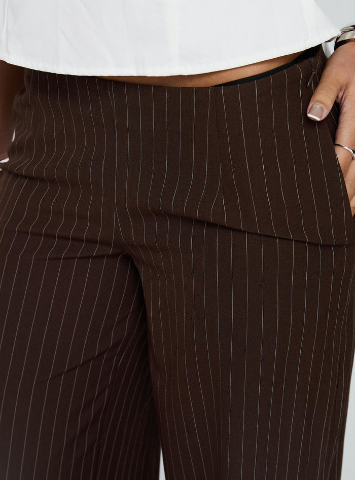 back view of model wearing Princess Polly Khane Low Rise Wide Leg Pant Brown Pinstripe Low Rise Pants