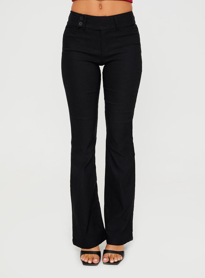 side view of model wearing Princess Polly Kinkirk Flared Pants Black Tall High Waisted Pants