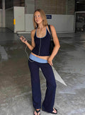 front view of model wearing Princess Polly Kobee Jersey Flare Pants Navy / Light Blue High Rise Pants