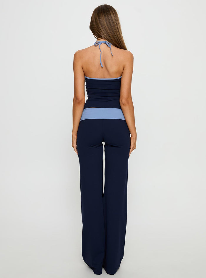 back view of model wearing Princess Polly Kobee Jersey Flare Pants Navy / Light Blue High Rise Pants