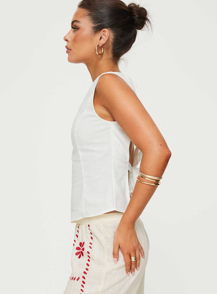 side view of model wearing Princess Polly Lilitina Top White Sleeveless High Neck