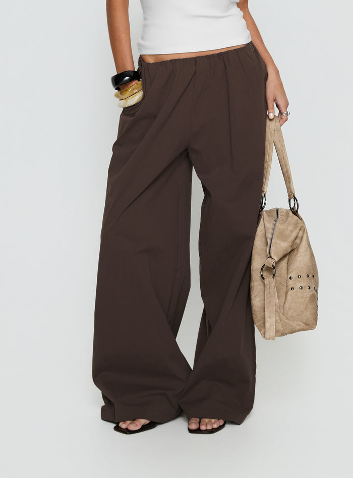 side view of model wearing Princess Polly Lunea Concealed Waistband Pants Brown Low Rise Pants