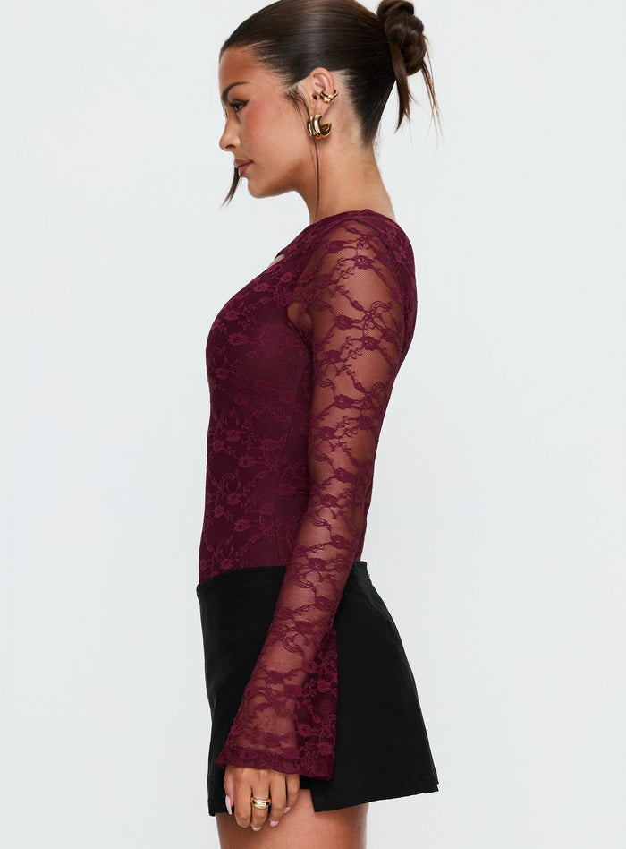 side view of model wearing Princess Polly Macaria Long Sleeve Lace Bodysuit Red Long Sleeve Tops Bodysuit