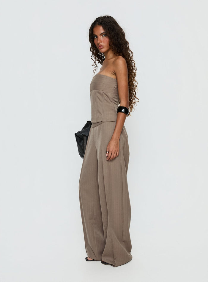 side view of model wearing Princess Polly Madelle Mid Rise Straight Leg Pants Brown Pinstripe Mid Rise Pants