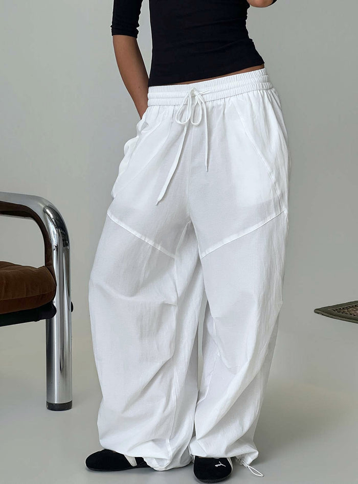 Discover the Mankind Baggy Cargo Pants White in womens-regular-pants with mid-rise, front view of model wearing Princess Polly