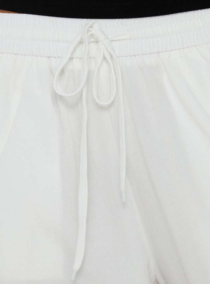 Showcasing Mankind Baggy Cargo Pants White in womens-regular-pants with mid-rise, product Princess Polly