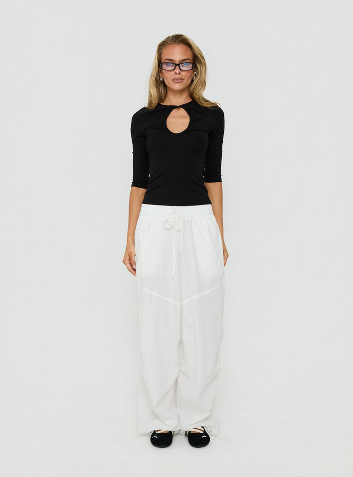 Discover the Mankind Baggy Cargo Pants White in womens-regular-pants with mid-rise, front view of model wearing Princess Polly