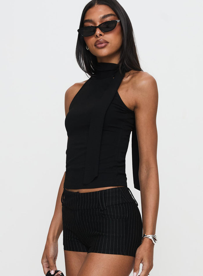 side view of model wearing Princess Polly Mathias Top Black Sleeveless High Neck