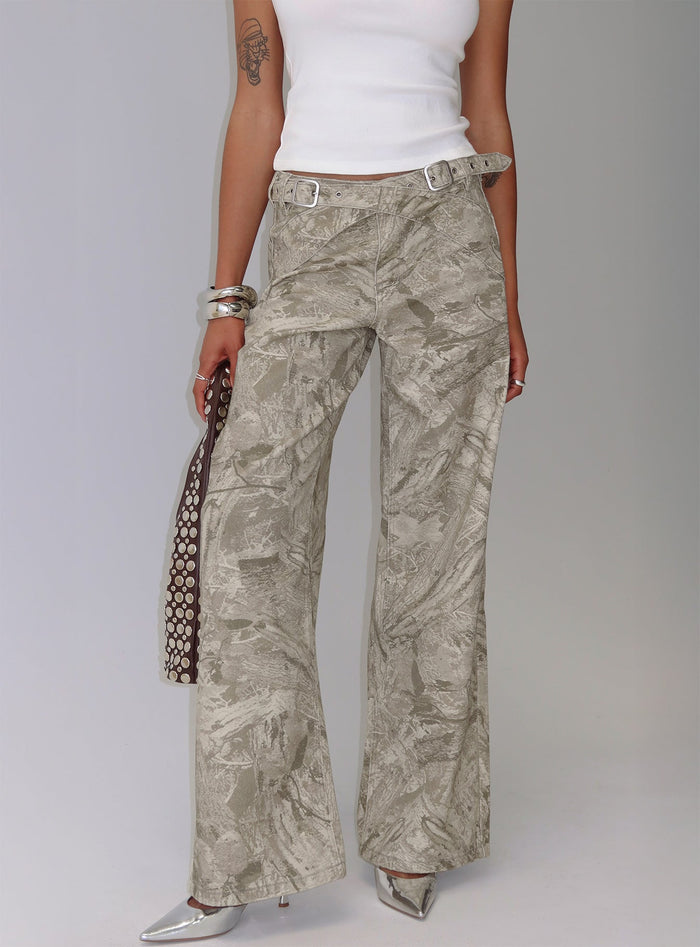 side view of model wearing Princess Polly Mckinley Mid Rise Wide Leg Jeans Camouflage Mid Rise Jeans