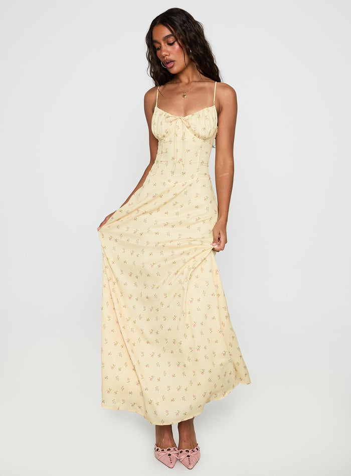 side view of model wearing Princess Polly Members Only Maxi Dress Yellow Floral Sweetheart Neckline
