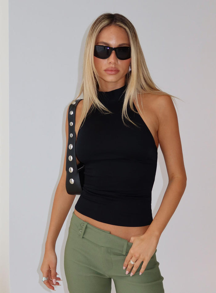 back view of model wearing Princess Polly Merril Halter Top Black Sleeveless High Neck