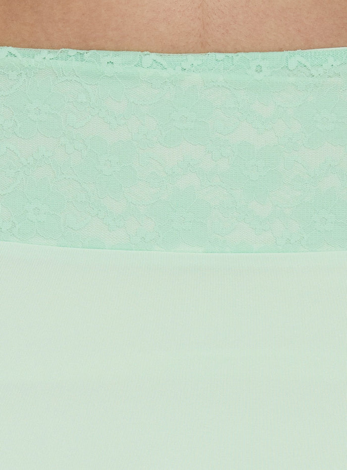 Showcasing the Natabelle Lace Detail Midi Skirt in Mint, a womens-skirts piece with asymmetry and fitted fit Princess Polly