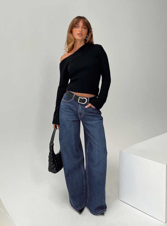back view of model wearing Princess Polly Naylor Wide Leg Jeans Mid Blue Denim Petite Mid Rise