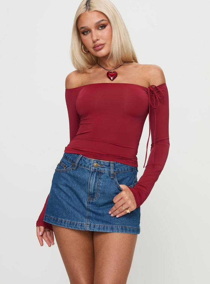 front view of model wearing Princess Polly Nicolina Low Rise Denim Mini Skirt Light Wash Mini Skirts