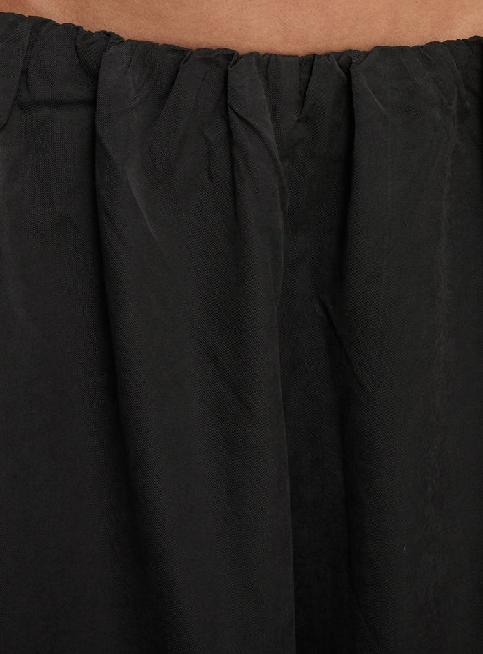 side view of model wearing Princess Polly Odara Wide Leg Pants Black Low Rise Pants