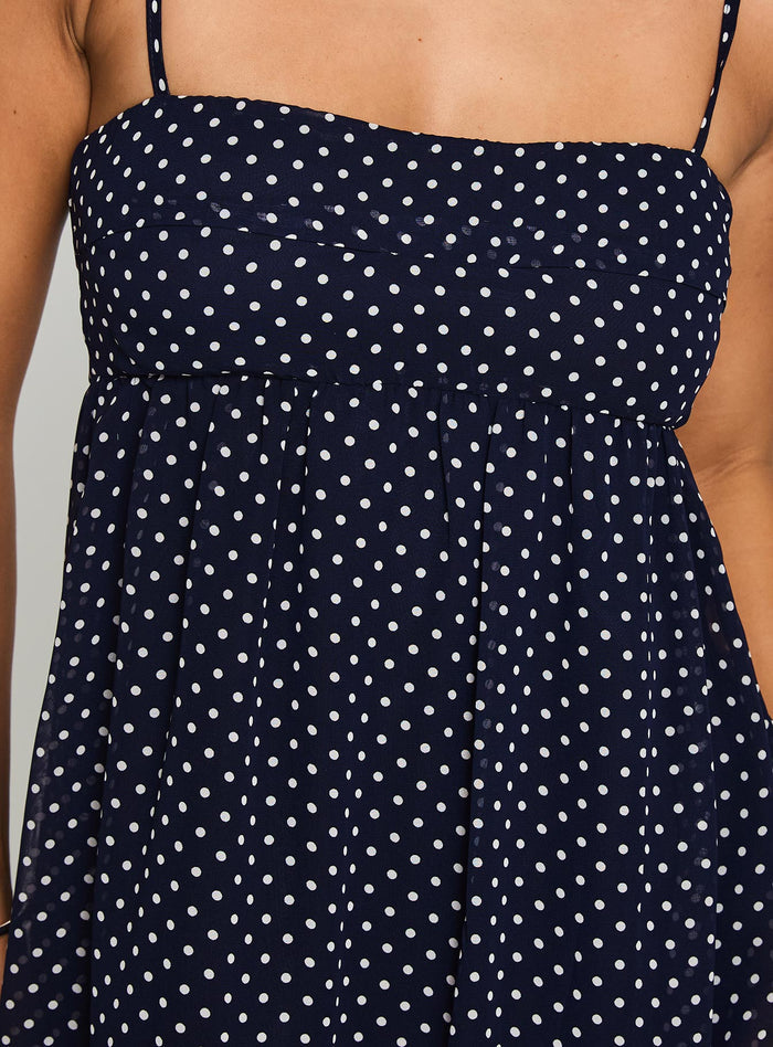 back view of model wearing Princess Polly Ortega Mini Dress Navy Polka Square Neck