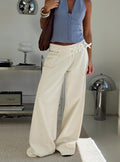 front view of model wearing Princess Polly Paltrow Cargo Jeans Cream Low Rise Jeans