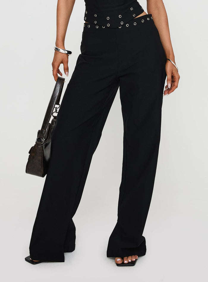 back view of model wearing Princess Polly Passionette Pants Black Petite High Waisted Pants