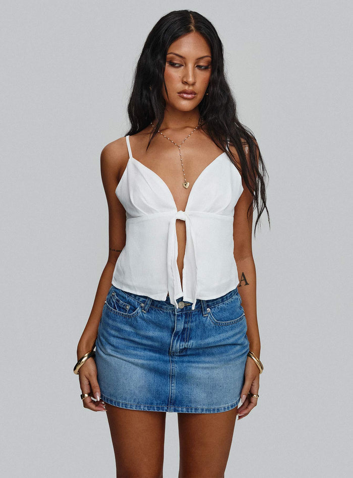 front view of model wearing Princess Polly Paulette Denim Mini Skirt Light Wash Mini Skirts