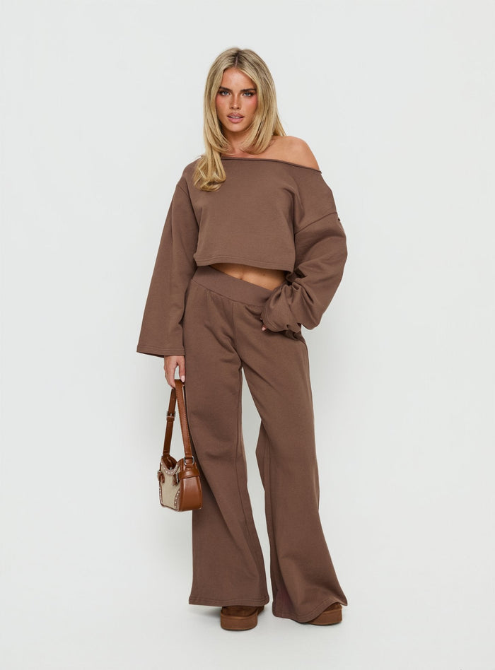 front view of model wearing Princess Polly Peaks Flared Track Pants Cocoa Mid Rise Pants