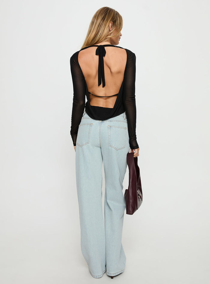 back view of model wearing Princess Polly Penny Mid Rise Straight Leg Jeans Light Denim Low Rise Jeans