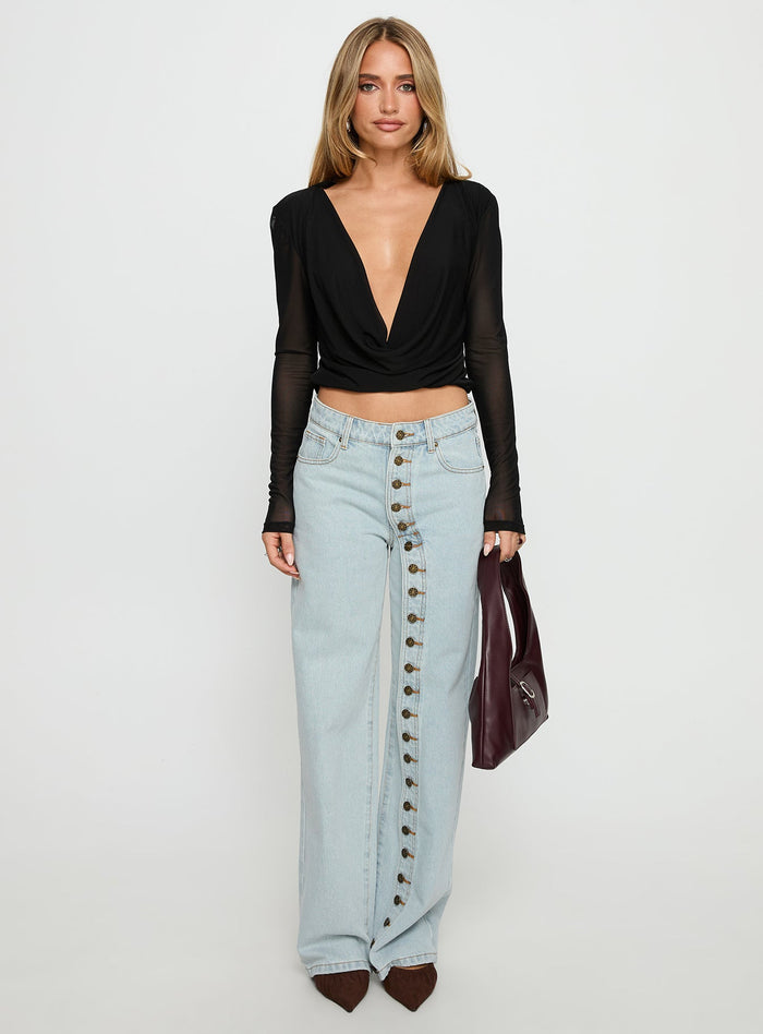 front view of model wearing Princess Polly Penny Mid Rise Straight Leg Jeans Light Denim Low Rise Jeans
