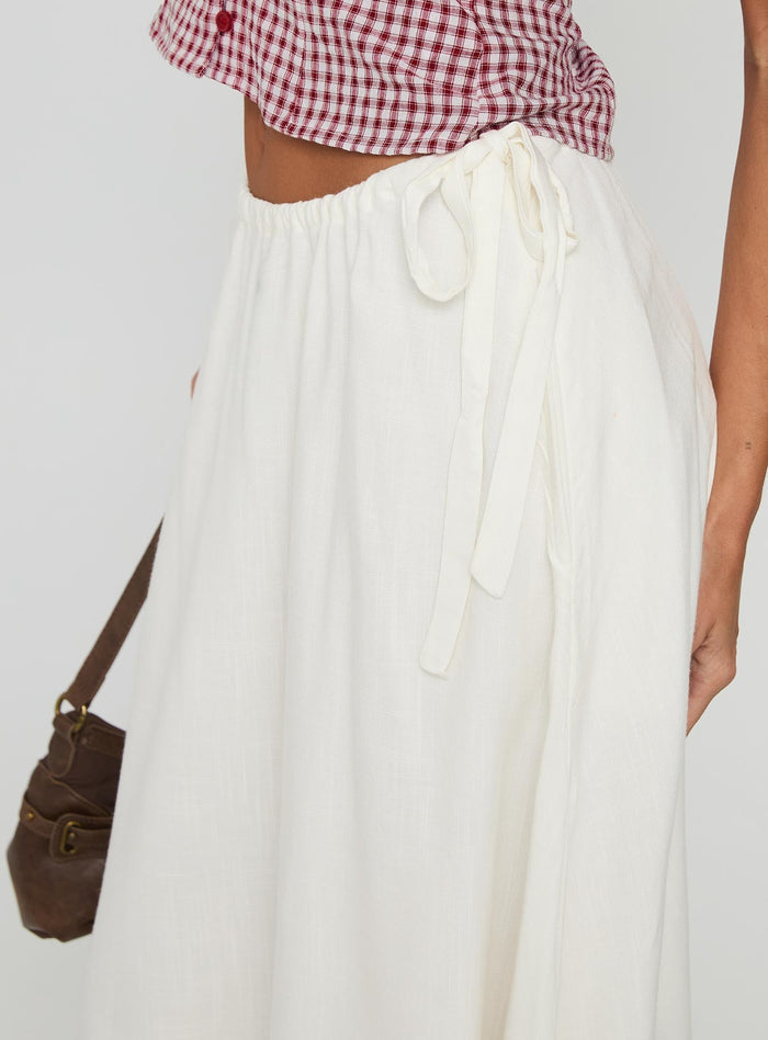 side view of model wearing Princess Polly Persuasion Tie Side Midi Skirt White Midi Skirts