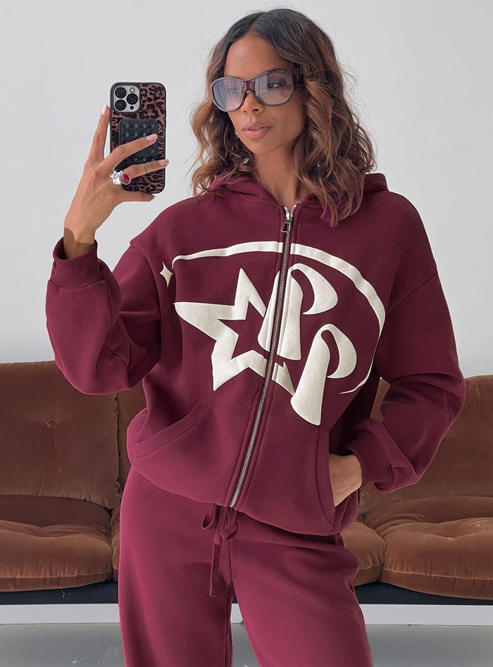 front view of model wearing Princess Polly Princess Polly Stargirl Zip Through Jumper Burgundy