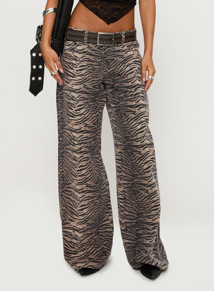 front view of model wearing Princess Polly Radical Baggy Jeans Tiger Low Rise Jeans