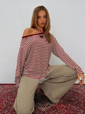 front view of model wearing Princess Polly Ralyssa Off Shoulder Long Sleeve Top Red Stripe Longline Jumpers Jumpers
